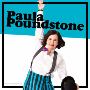 Paula Poundstone hanging off the frame of the image.