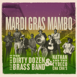 Members of Mardi Gras Mambo assembled on a streetscape
