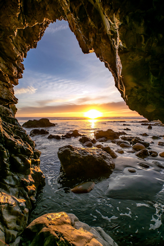 Sunset outside ocean cave by Vivian Krug