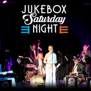 Jukebox Saturday Night performing on stage.