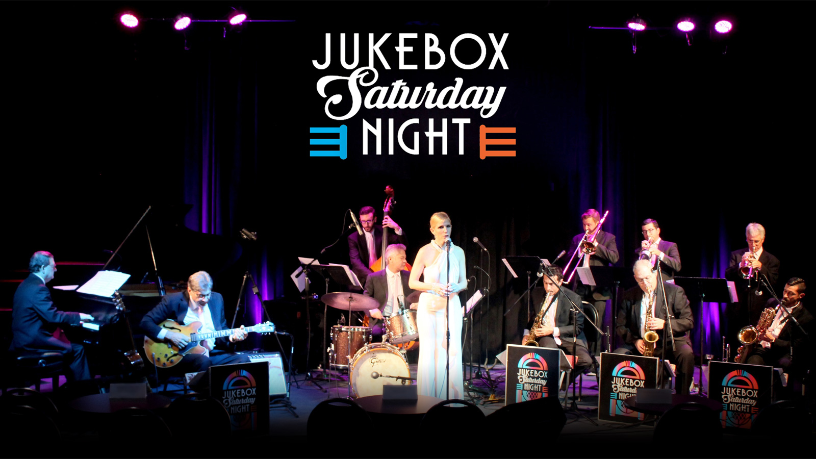 Jukebox Saturday Night performing on stage.