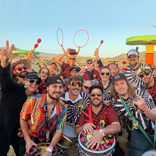 Members of Samba Loca gathered with colorful instruments