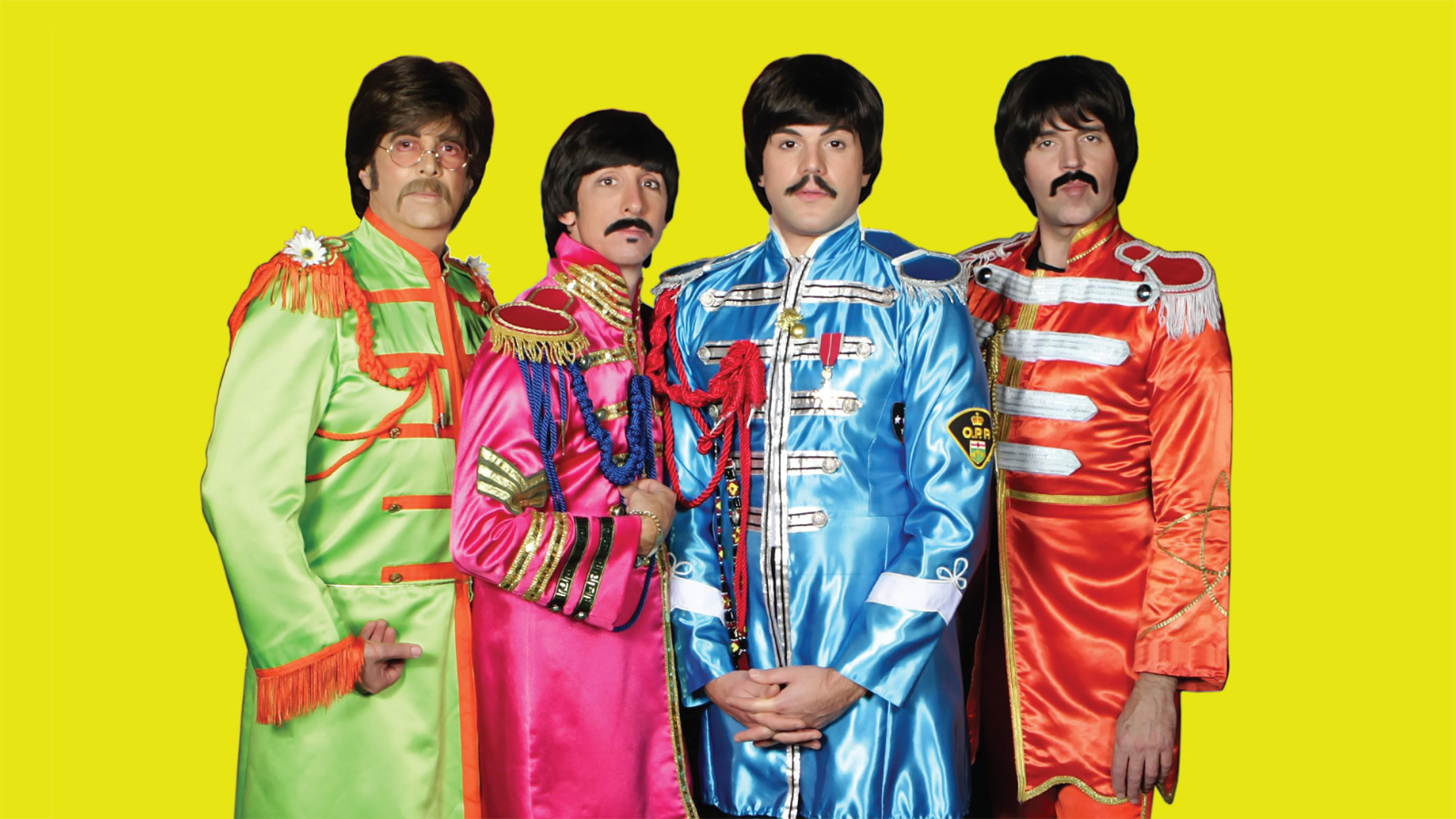 Members of the Yesterday band dressed as Sargent Peppers