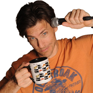 Don Friesen with mug and microphone