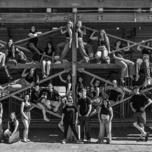 Members of AGHS Dance assembled on scaffolding