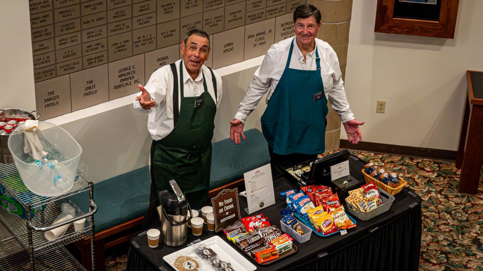 Volunteers serving concessions in the Lobby