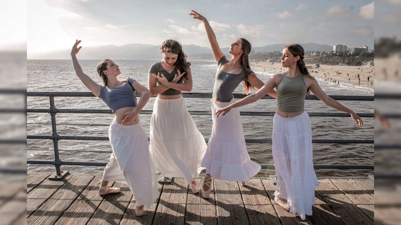 Flex dancers posing on the beach
