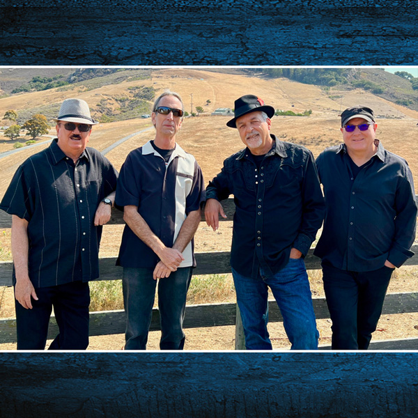 Members of Burning James Blues Band posing outdoors