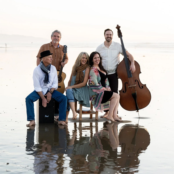 Members of Rosewood and Honey Band posing at the beach